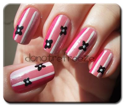 Perhaps the following design would be great for short nails by making them