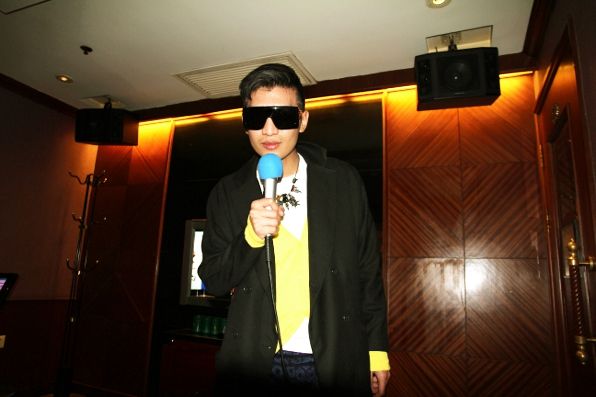 Bryanboy singing a song at karaoke in Shanghai