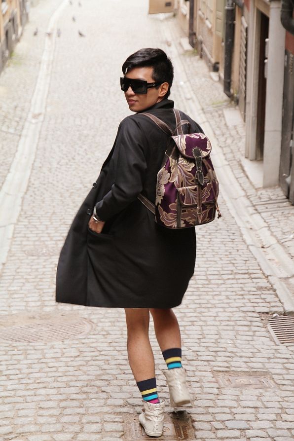 Bryanboy wearing a backpack at Gamla Stan in Stockholm