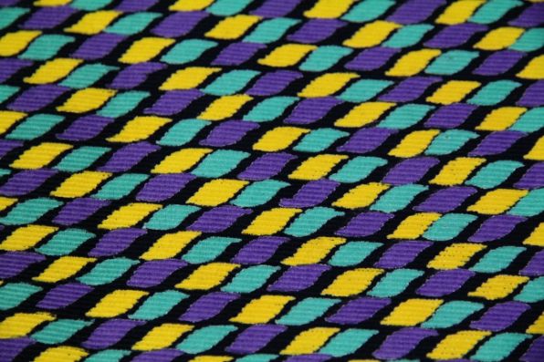 Printed Indian cotton fabric in turquoise, purple, yellow