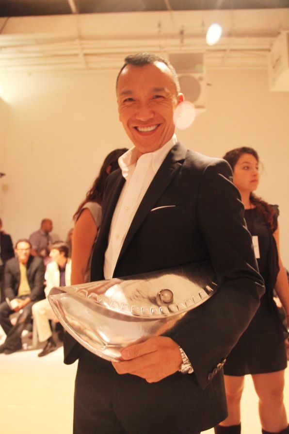 Joe Zee carrying a Margiela clutch bag