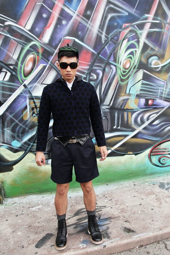 Bryanboy standing in front of a graffiti wall in Silver Lake, Los Angeles