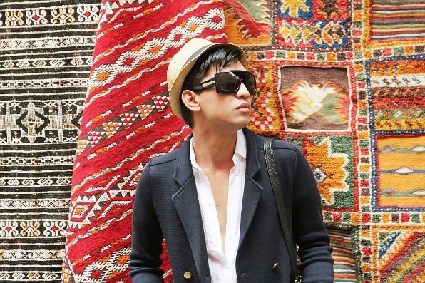 Bryanboy outside a store selling Moroccan carpets