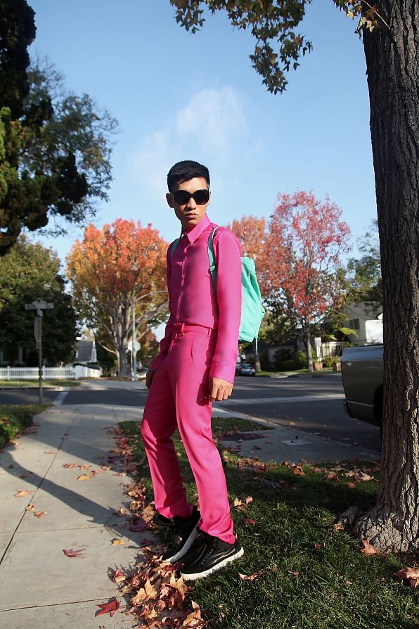 Bryanboy in a pink shirt and pink trousers by Versace x H&M