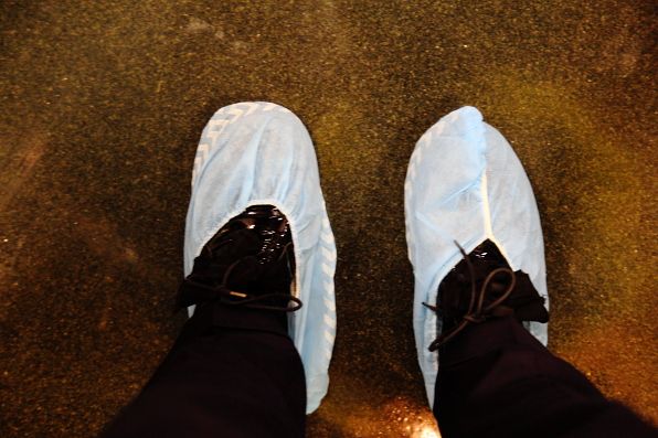 Shoe covers at the Prada Tokyo show venue