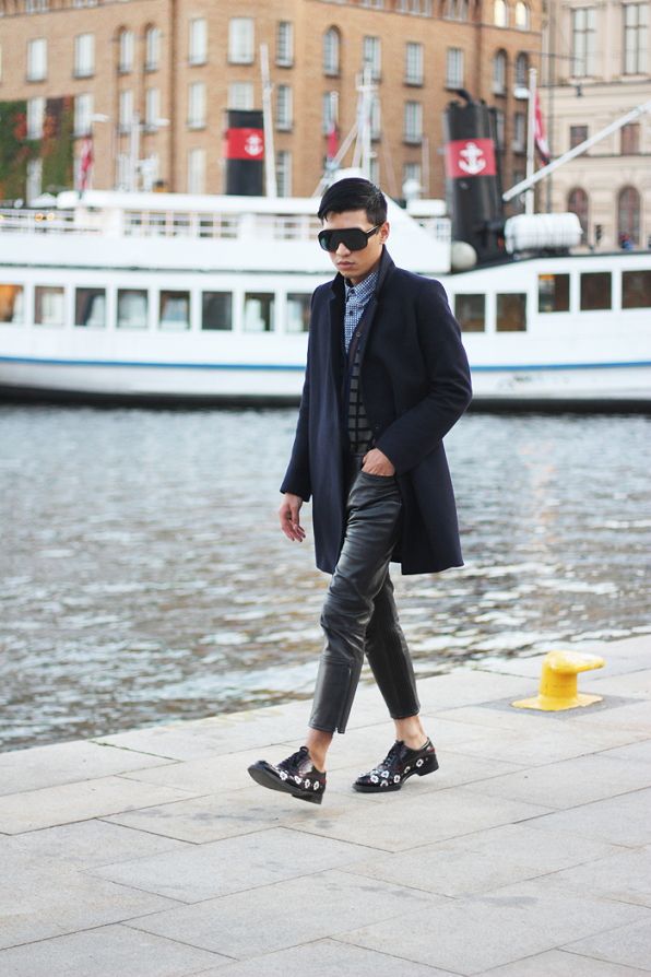 Bryanboy wearing leather Acne pants in Stockholm