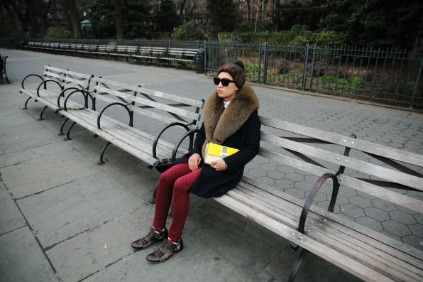 Bryanboy sitting on a bench in Brooklyn Heights