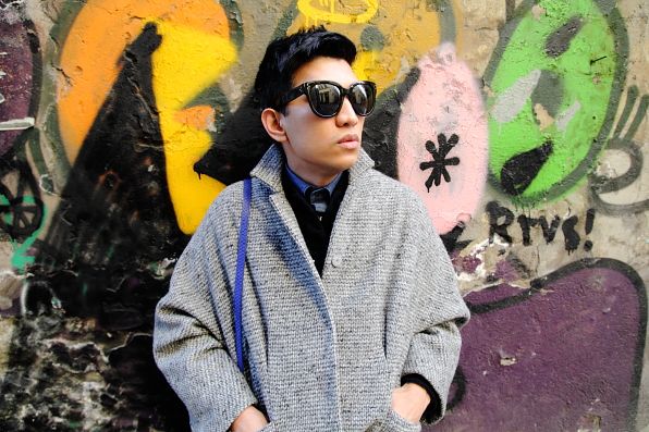 Bryanboy wearing a gray coat from Cachentta NYC