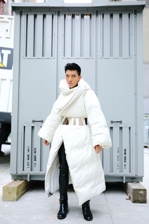 Bryanboy wearing a Maison Martin Margiela x H&M collaboraton duvet coat
