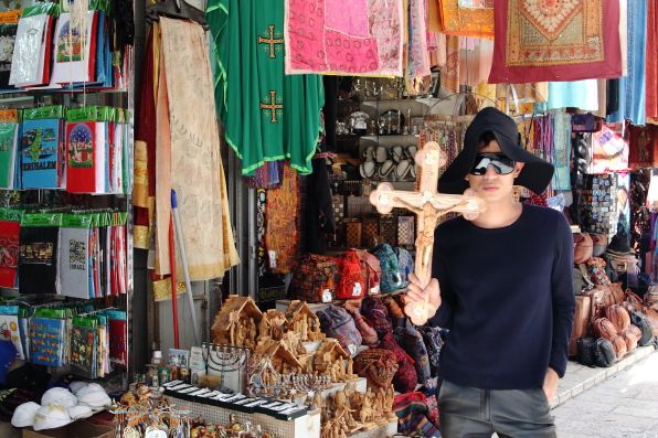 Bryanboy holding a crucifix in Jerusalem