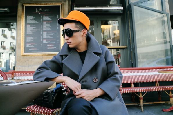 Bryanboy at Saint Germain wearing a Kenzo hat and Sonia Rykiel coat