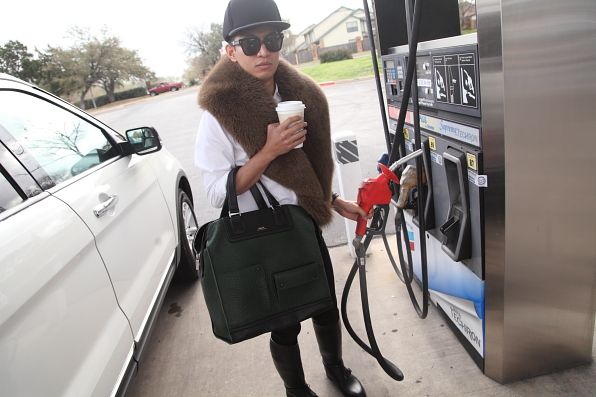 Bryanboy pumping gas in Austin, Texas