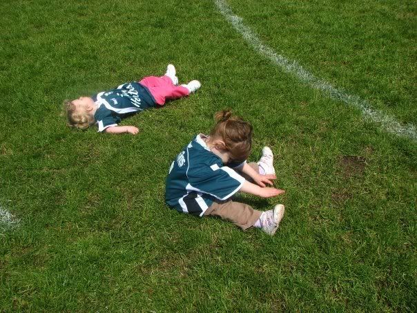 soccer1.jpg Stretching and relaxing image by mwalsh_2008