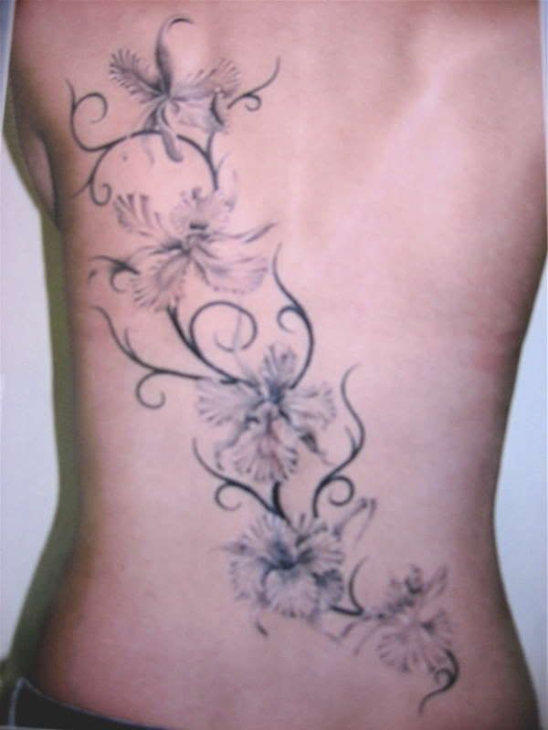 black flower tattoo. Tattoos with Zen