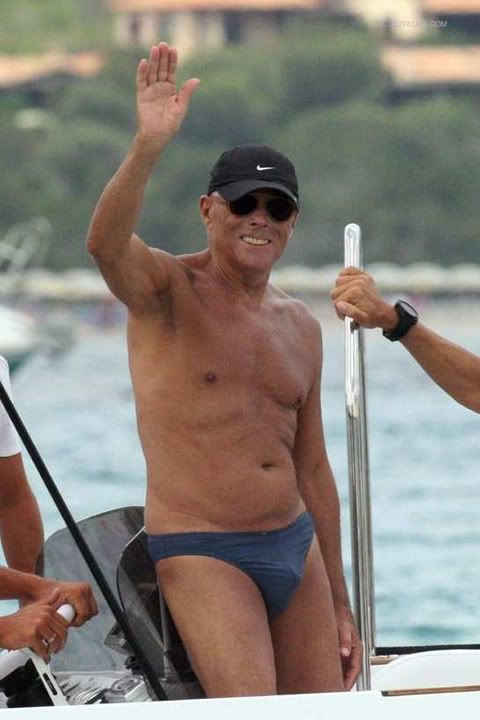 Giorgio Armani in swimming trunks photo.